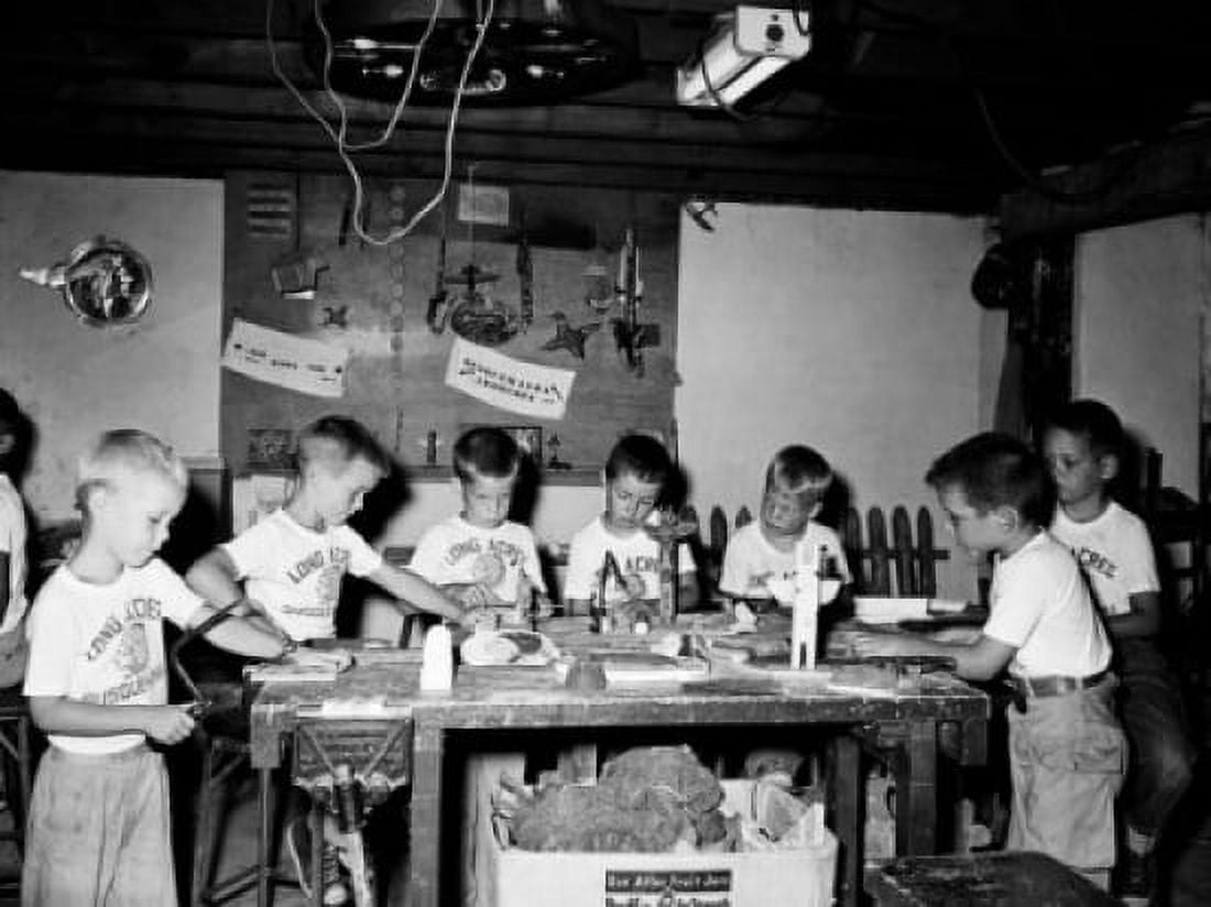 Group of boys working in a carpentry workshop Canvas Art - (24 x 36)