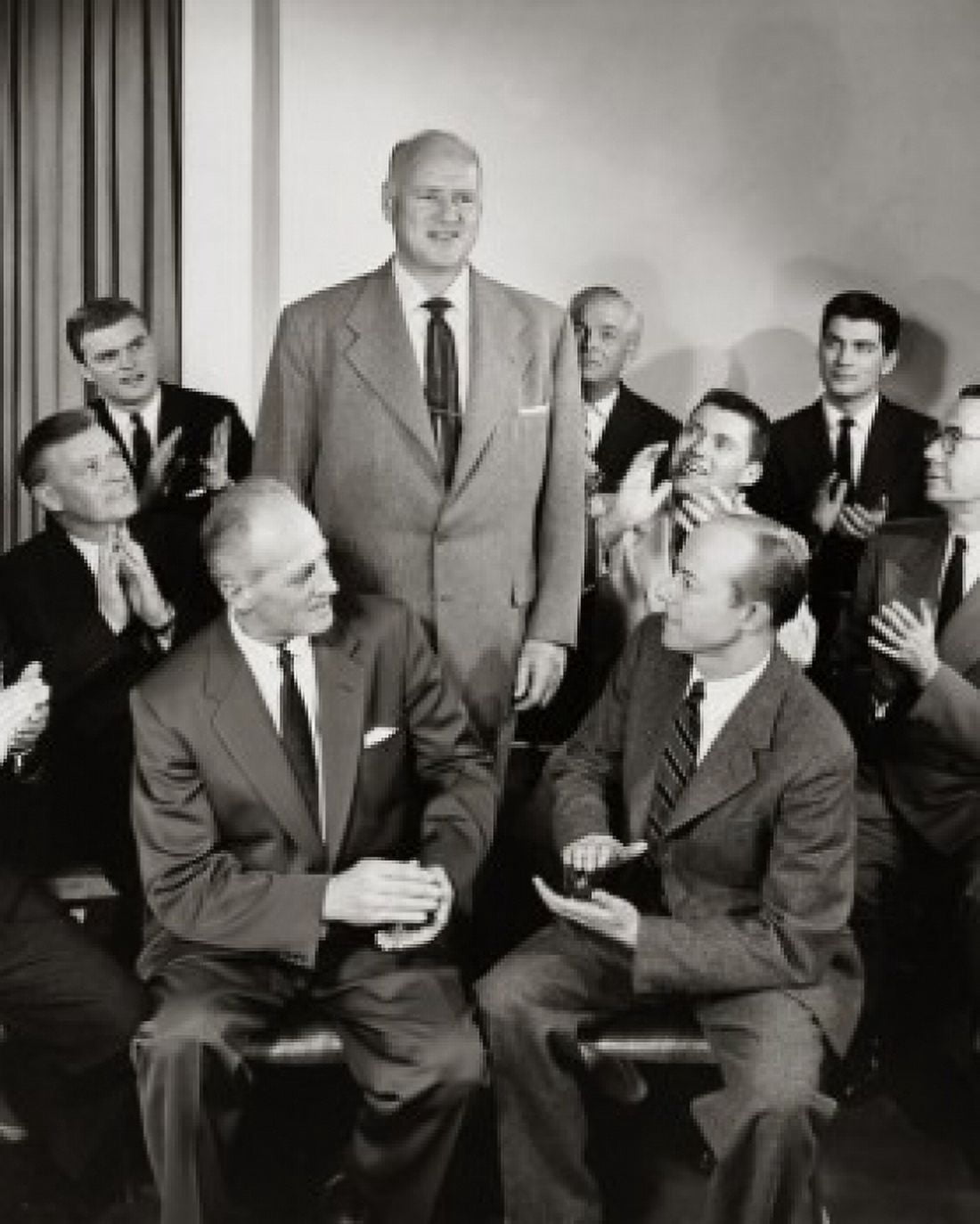 Group of businessmen applauding their colleague Canvas Art - (18 x 24)
