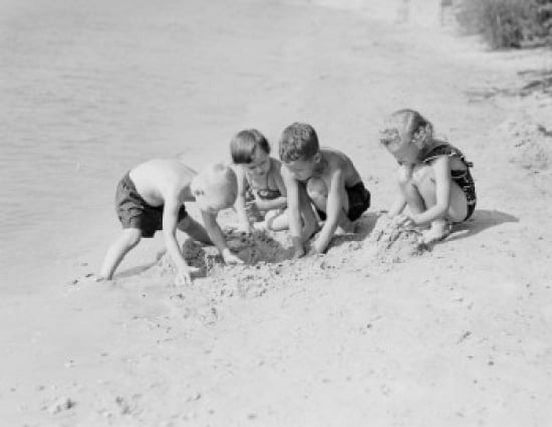 Group of children building sand castle on sandy beach Canvas Art - (18 x 24)