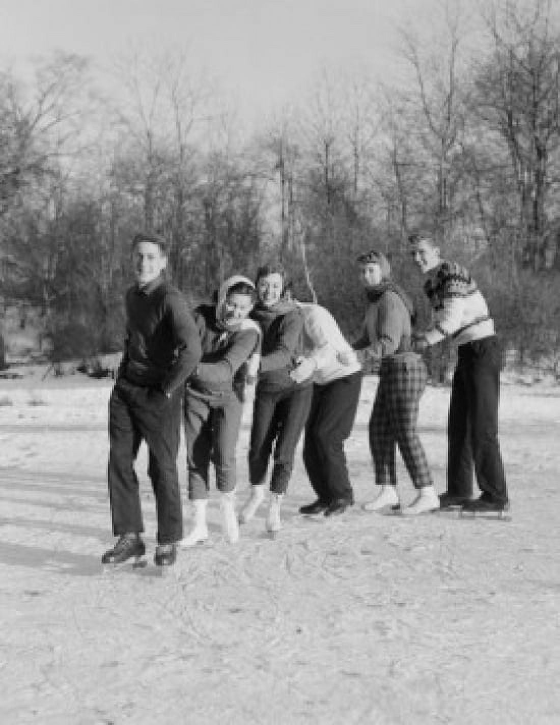 Group of friends ice-skating Canvas Art - (24 x 36)