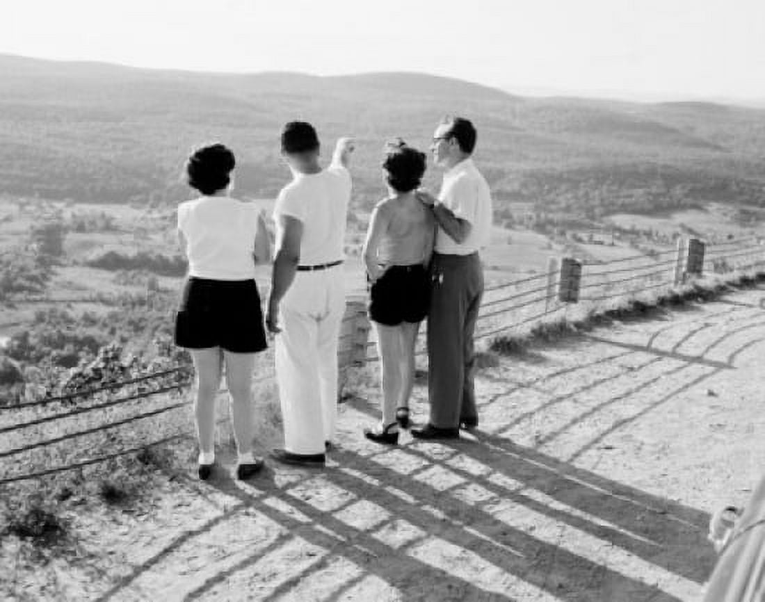 Group of friends looking at landscape Canvas Art - (24 x 36)