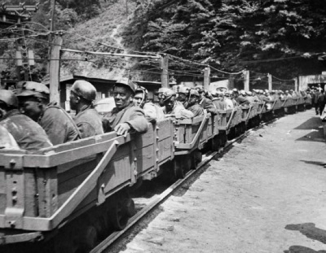 Group of miners going into a mine on carts Canvas Art - (18 x 24)