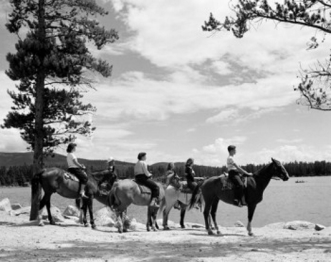 Group of people on horses standing at the edge of water Canvas Art - (24 x 36)