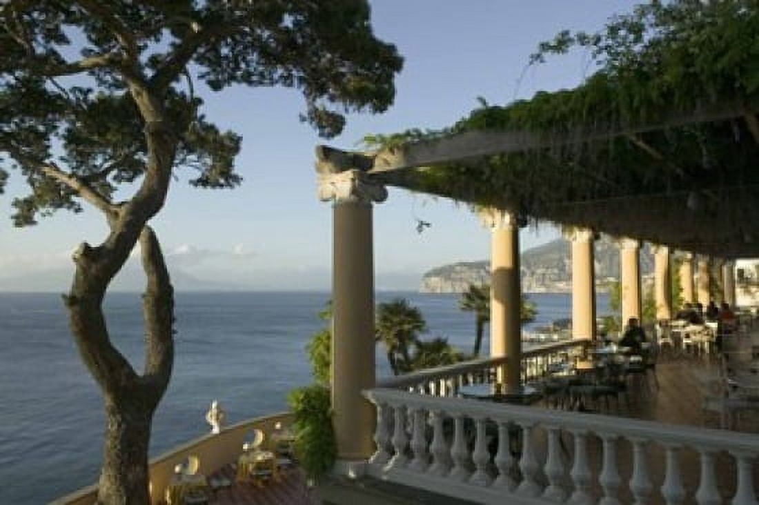 Group of people sitting in a restaurant by the sea Imperial Tramontano Sorrento Naples Campania Italy Canvas Art - Panoramic Images (16 x 11)