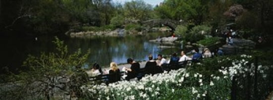 Group of people sitting on benches near a pond Central Park Manhattan New York City New York State USA Canvas Art - Panoramic Images (36 x 13)