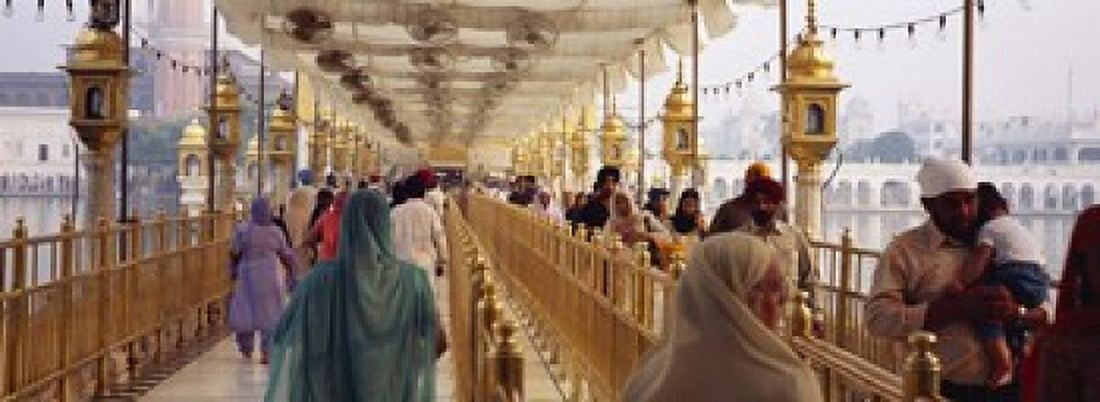 Group of people walking on a bridge over a pond Golden Temple Amritsar Punjab India Canvas Art - Panoramic Images (18 x 7)