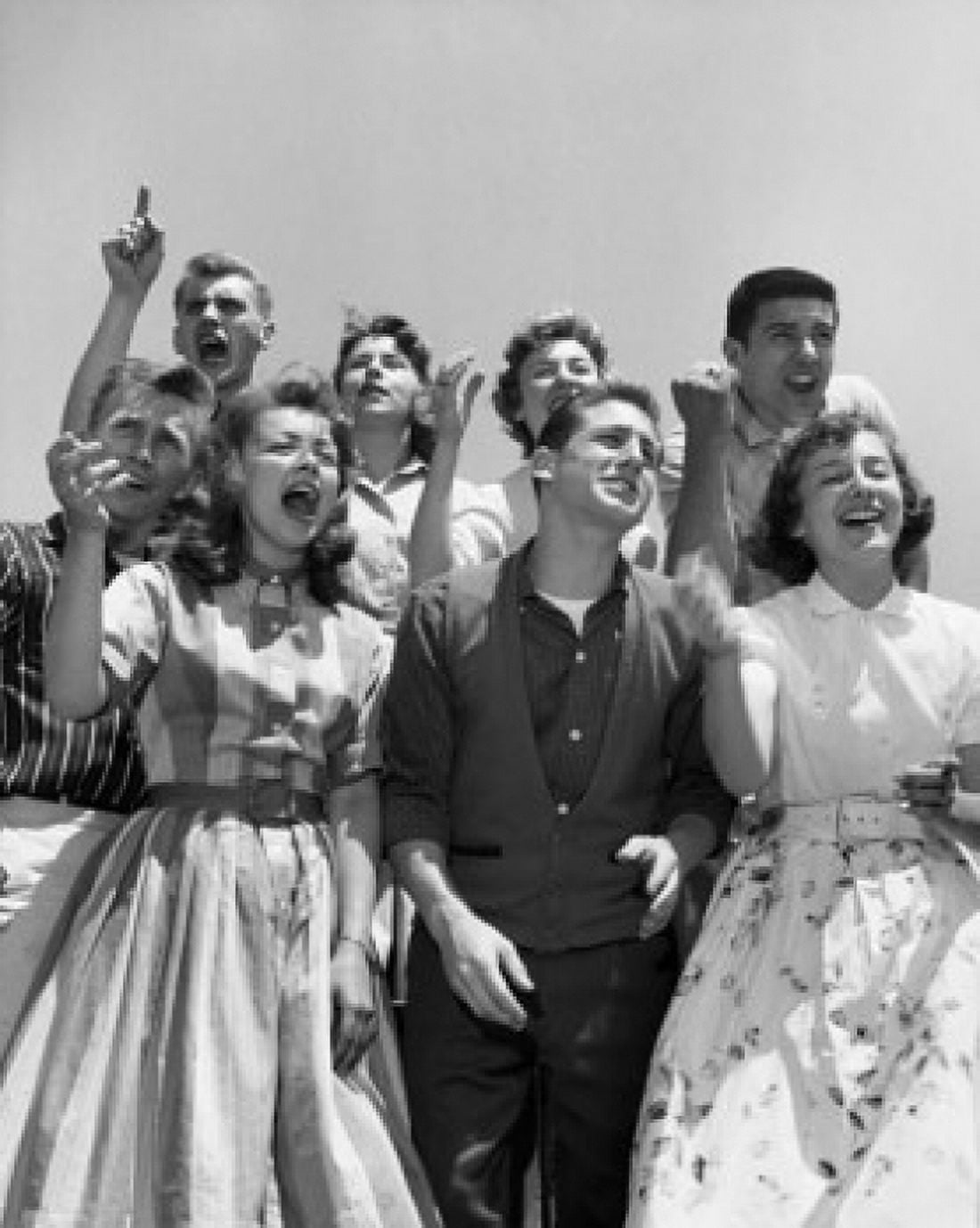 Group of teenagers cheering Canvas Art - (24 x 36)