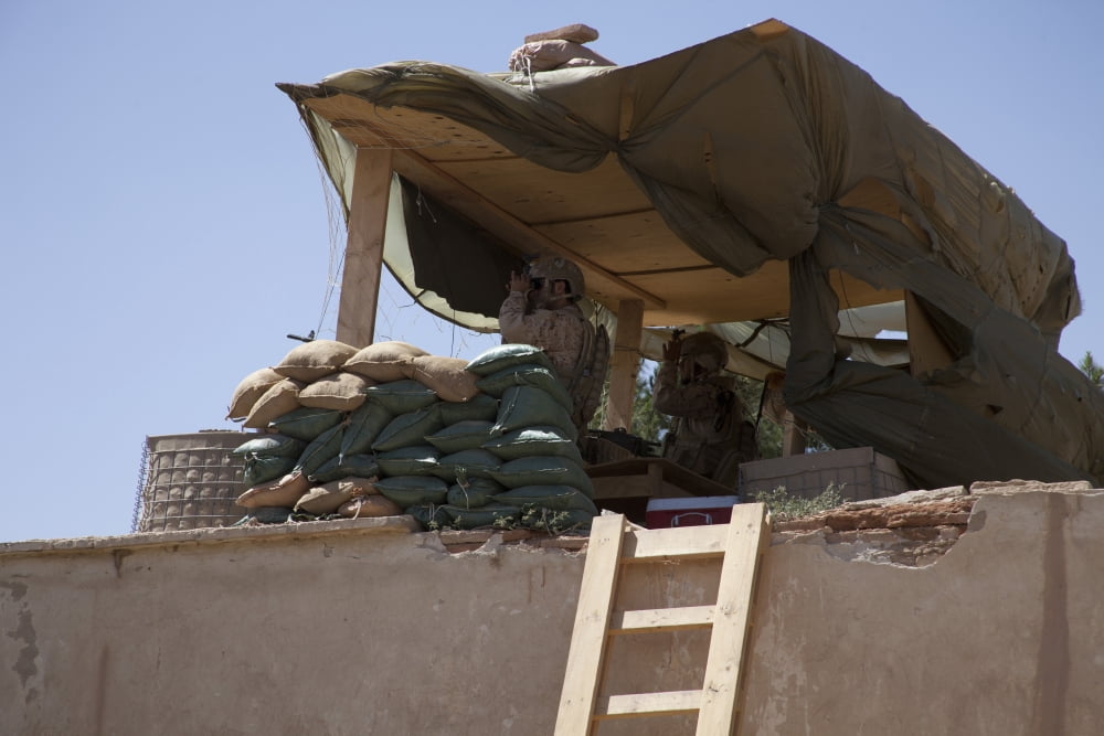 Guards from the United Arab Emirates Army stand watch at an outpost Canvas Art - Stocktrek Images (35 x 23)