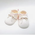 thumbnail image 1 of Gum Paste Baby Boy White Shoes with Laces Cake Topper, 1 of 7