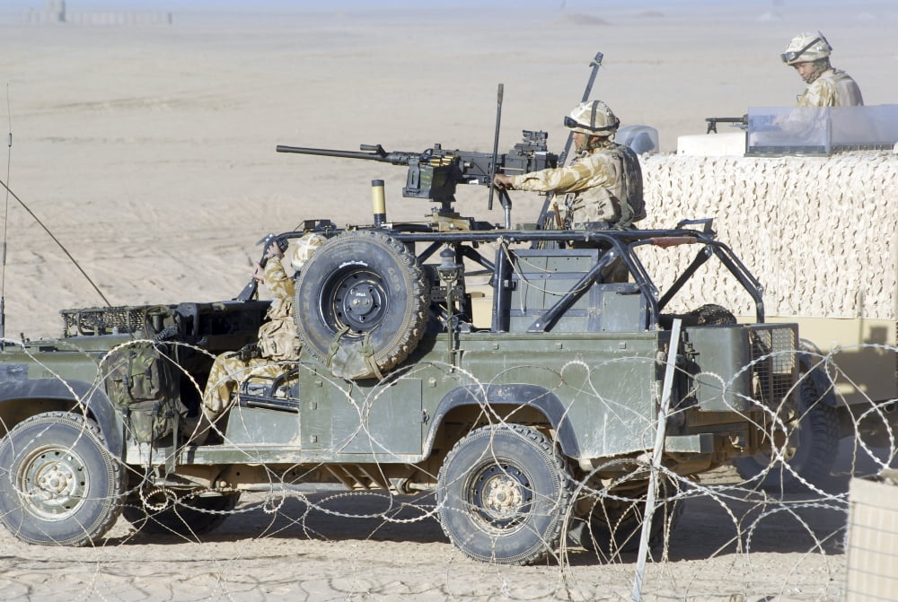 Gurkhas patrol Afghanistan in a Land Rover Canvas Art - Andrew ChittockStocktrek Images (17 x 12)