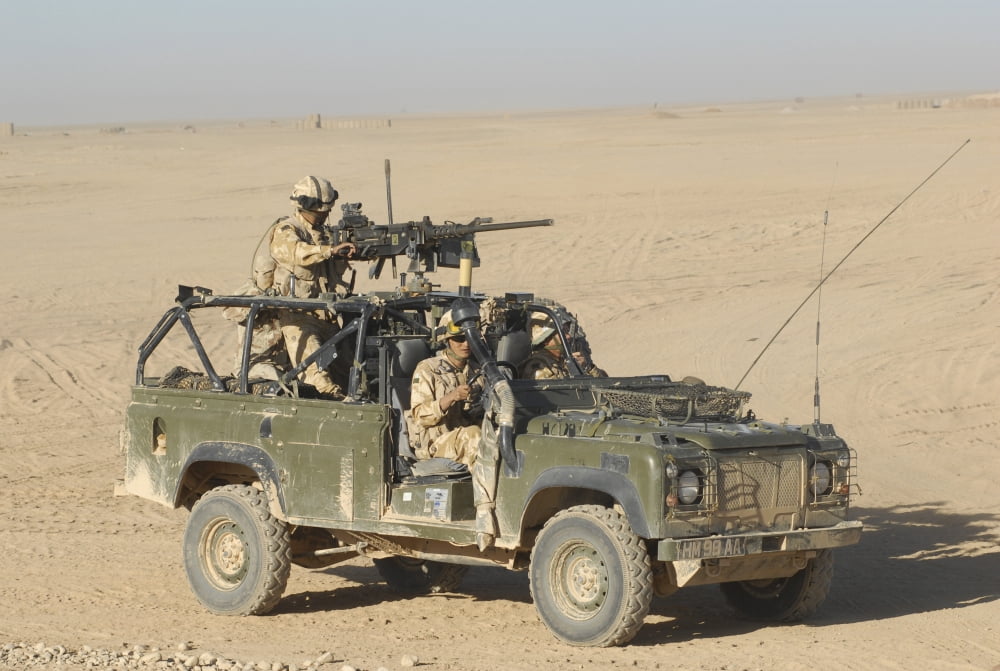 Gurkhas patrol Afghanistan in a Land Rover Canvas Art - Andrew ChittockStocktrek Images (34 x 23)