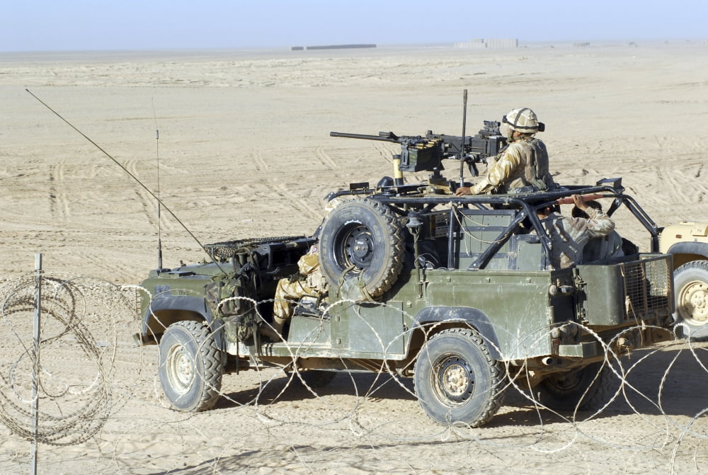 Gurkhas patrol Afghanistan in a Land Rover Canvas Art - Andrew ChittockStocktrek Images (34 x 23)