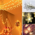 thumbnail image 1 of Gustave 32.81ft Christmas Snowflake String Lights Battery Powered Waterproof 80LEDs Fairy Lights for Xmas Garden Party Decor Celebration Lighting "Warm White, 80LED", 1 of 10