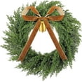 thumbnail image 1 of Guvpev 22" Christmas Cedar Wreath for Front Door, Artificial Christmas Wreath Seasonal Decor, Faux Green Fake Cedar Wreath with Bell & Brown Velvet Ribbon for Indoor Outdoor Christmas Decorations, 1 of 10