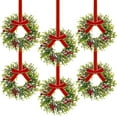 thumbnail image 1 of Guvpev 6 Pieces 10" Mini Christmas Wreath with Red Berry, Cabinet Wreaths for Kitchen, Small Christmas Wreath with Red and Black Plaid Bow, Farmhouse Wreath for Holiday Xmas Party Decorations, 1 of 7