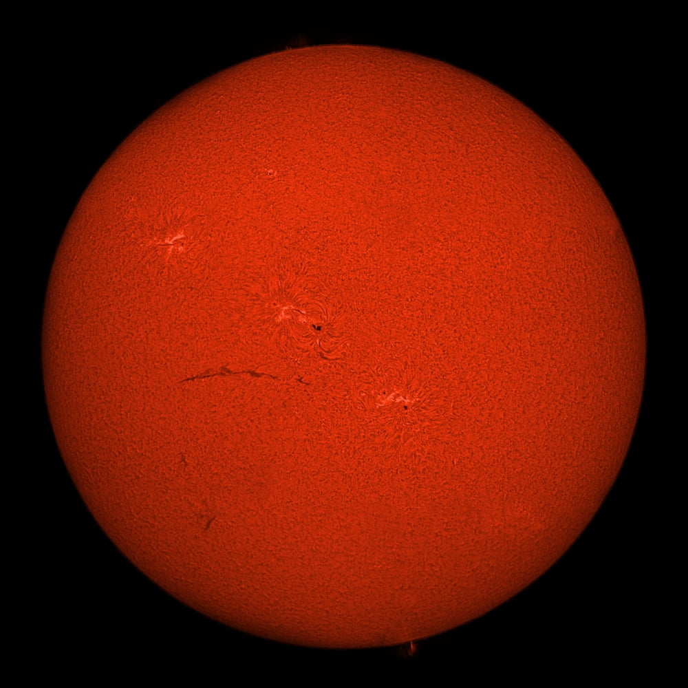H-alpha full Sun in red color with active areas and filaments Canvas Art - Rolf GeissingerStocktrek Images (28 x 28)