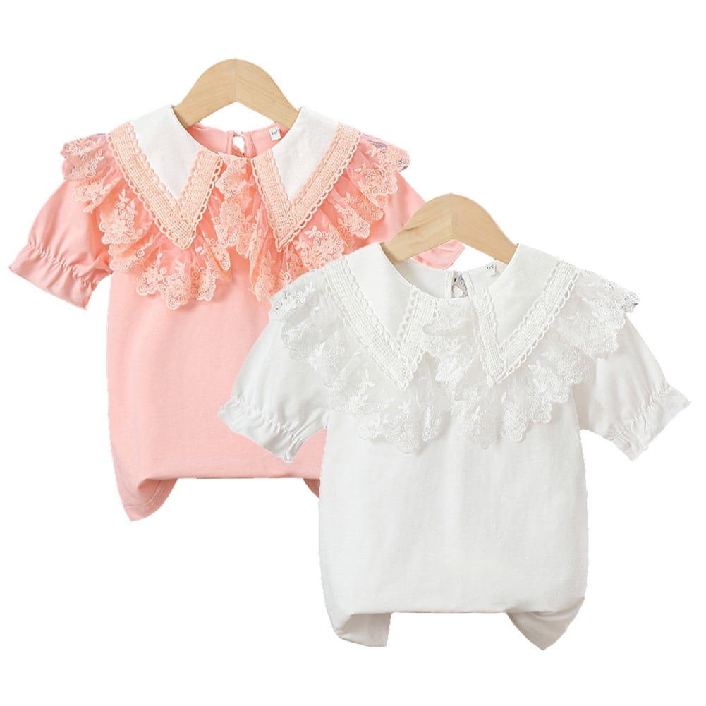 white shirt with ruffle bottom