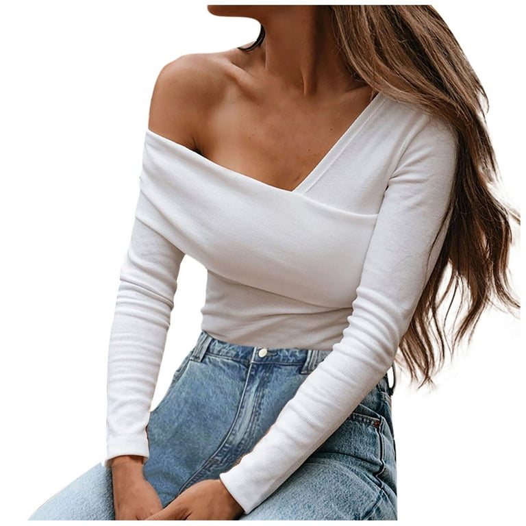 Long-sleeved V-neck sweater with a strapless top Long-sleeved V-neck sweater with a strapless top