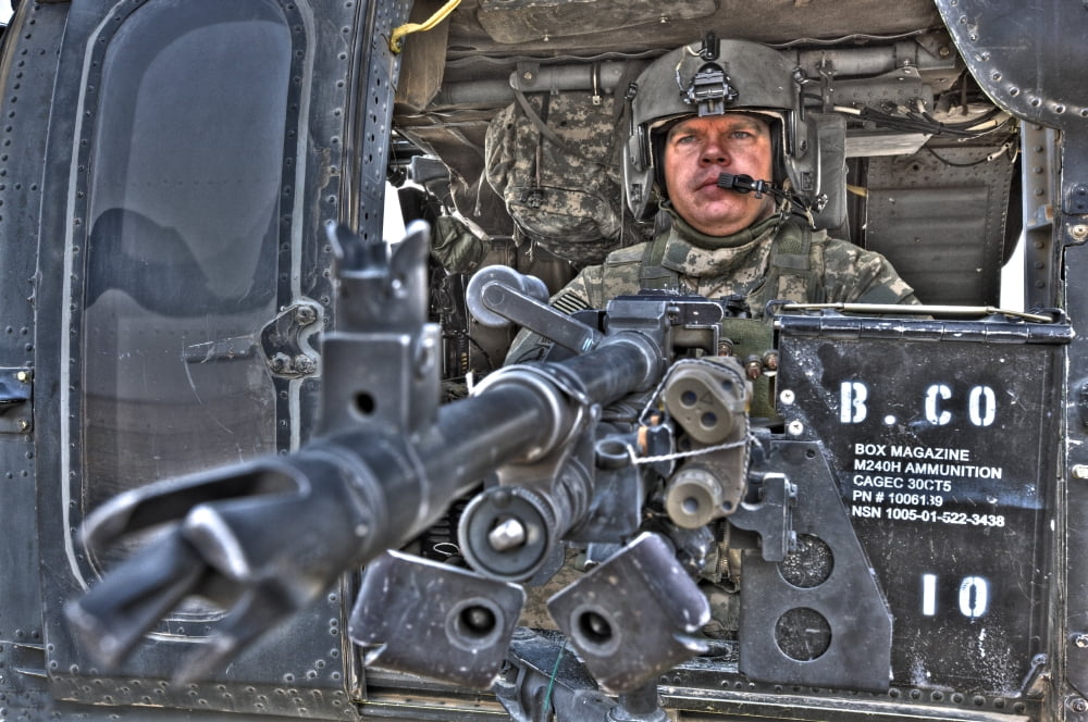 HDR image of a UH-60 Black Hawk door gunner manning a M240 machine gun Canvas Art - Terry MooreStocktrek Images (18 x 12)