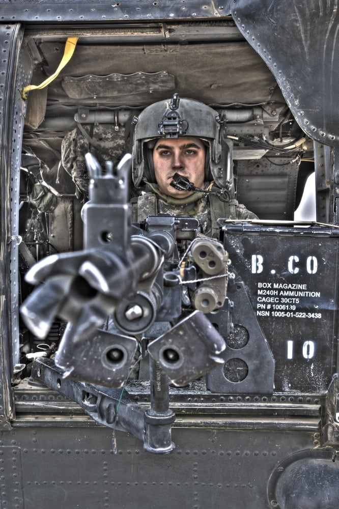 HDR image of a UH-60 Black Hawk door gunner manning a M240 machine gun Canvas Art - Terry MooreStocktrek Images (23 x 35)