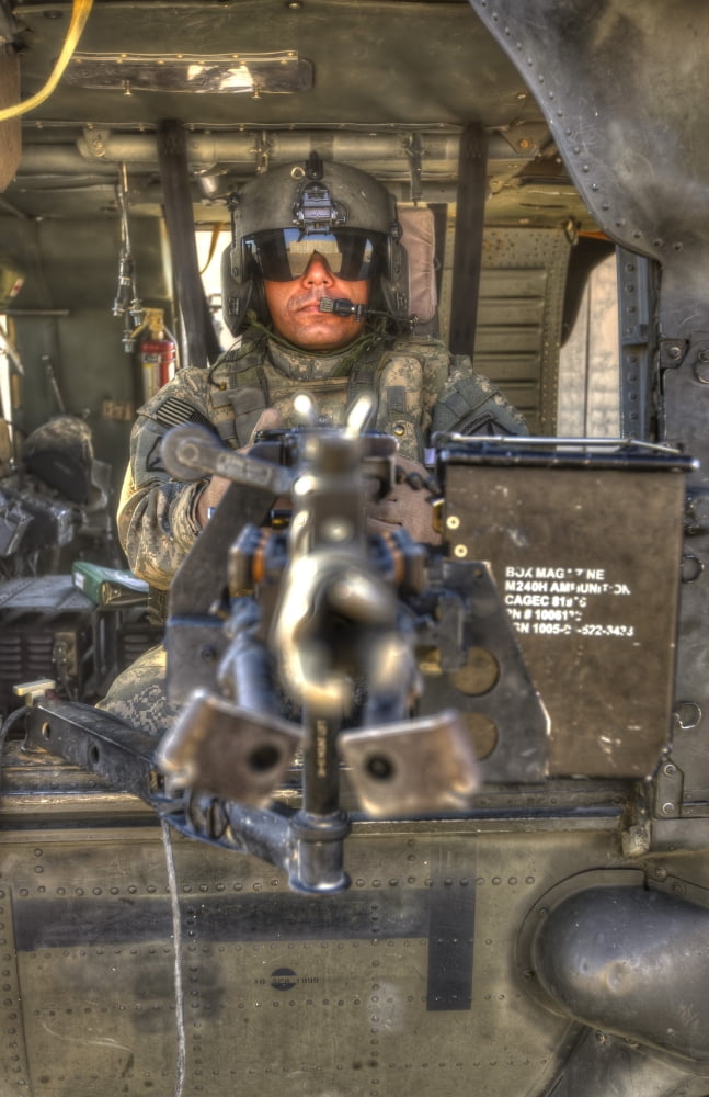 HDR image of a UH-60 Black Hawk door gunner manning a M240 machine gun Canvas Art - Terry MooreStocktrek Images (23 x 35)
