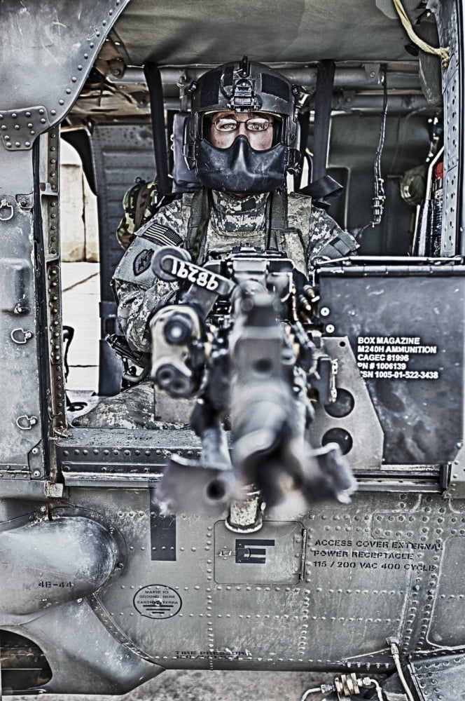HDR image of a UH-60 Black Hawk door gunner manning a M240 machine gun Canvas Art - Terry MooreStocktrek Images (23 x 35)