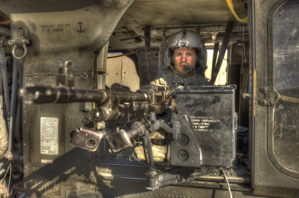 HDR image of a UH-60 Black Hawk door gunner manning a M240 machine gun Canvas Art - Terry MooreStocktrek Images (35 x 24)