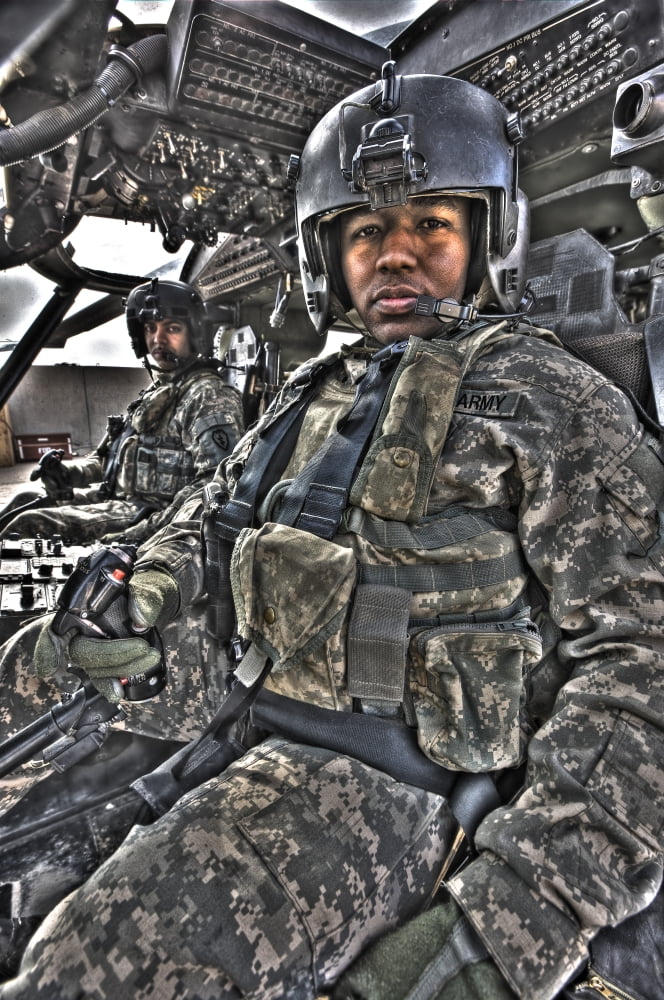 HDR image of a pilot sitting in the cockpit of a UH-60 Black Hawk Canvas Art - Terry MooreStocktrek Images (12 x 18)