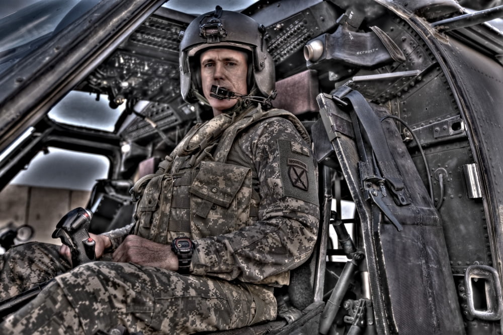 HDR image of a pilot sitting in the cockpit of a UH-60 Black Hawk Canvas Art - Terry MooreStocktrek Images (18 x 12)