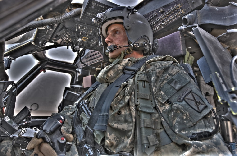 HDR image of a pilot sitting in the cockpit of a UH-60 Black Hawk Canvas Art - Terry MooreStocktrek Images (35 x 23)