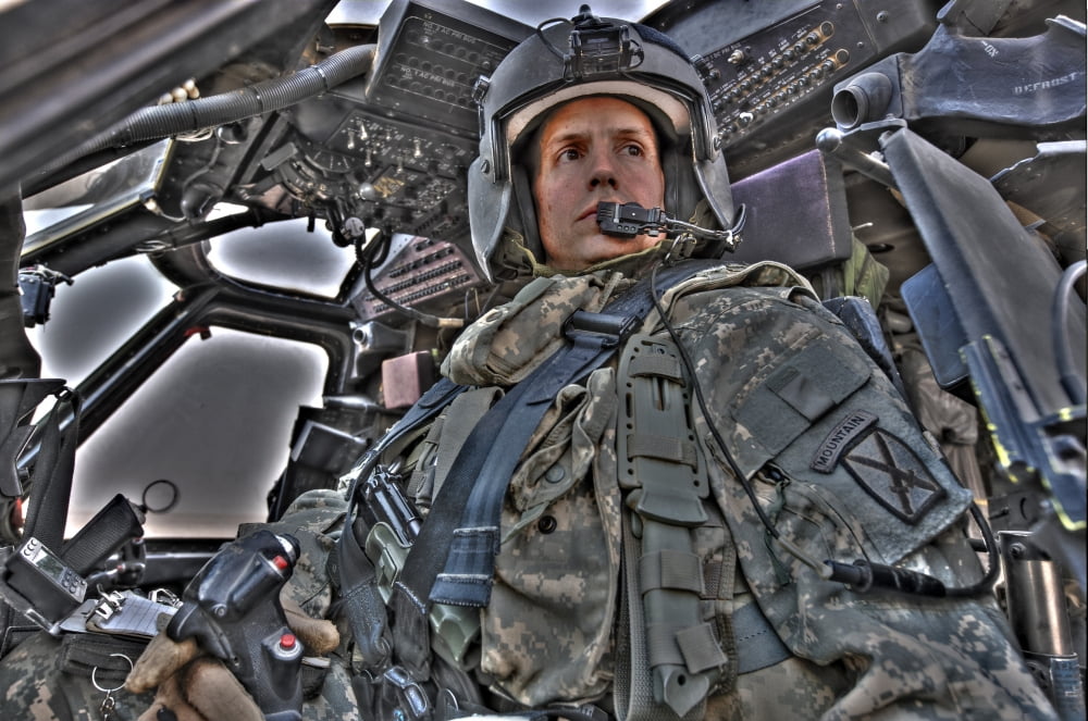 HDR image of a pilot sitting in the cockpit of a UH-60 Black Hawk Canvas Art - Terry MooreStocktrek Images (35 x 23)