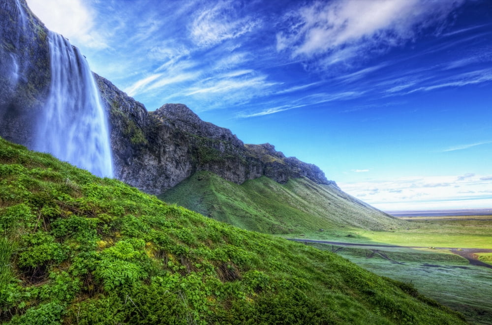 HDR of waterfall Seljalandsfoss along the southern coast of Iceland Iceland Canvas Art - Robert Postma Design Pics (34 x 22)