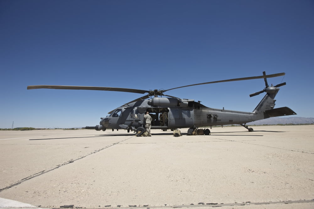 HH-60G Pave Hawk with pararescuemen Canvas Art - Terry MooreStocktrek Images (35 x 23)