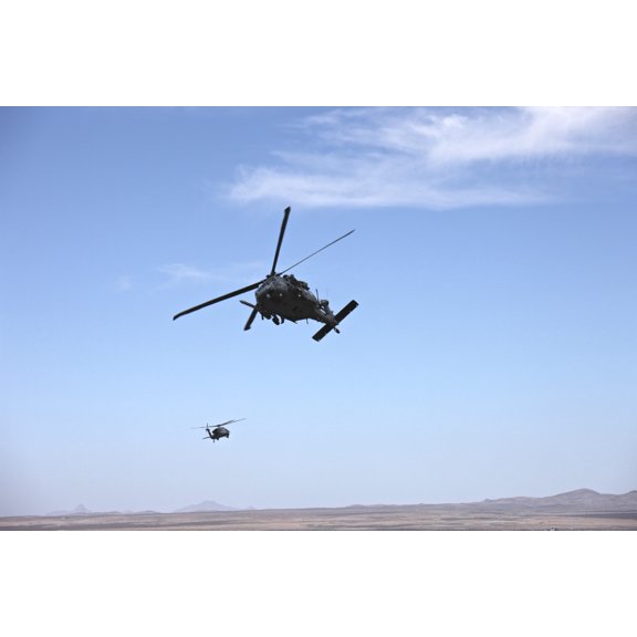 HH-60G Pave Hawks flying above the Playas Training Area New Mexico Canvas Art - Terry MooreStocktrek Images (18 x 12)