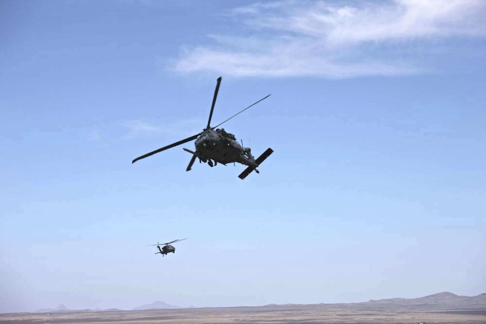 HH-60G Pave Hawks flying above the Playas Training Area New Mexico Canvas Art - Terry MooreStocktrek Images (35 x 23)