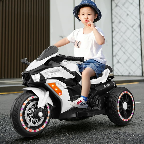 HNH 12V Kids Ride On Motorcycle, Kids Motorcycle, 4mph Speed w/Headlights,Training Wheels,Bluetooth Music, Pedal, Battery Charger-White