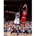 thumbnail image 1 of Hakeem Olajuwon Houston Rockets Unsigned Red Jersey Shooting Photograph, 1 of 1