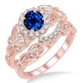 thumbnail image 1 of Halo Art Deco 2.5 Carat Blue Sapphire And Moissanite Diamond Wedding Ring Vintage Floral Bridal Set Engagement Ring on 10k Rose Gold, 1 of 3