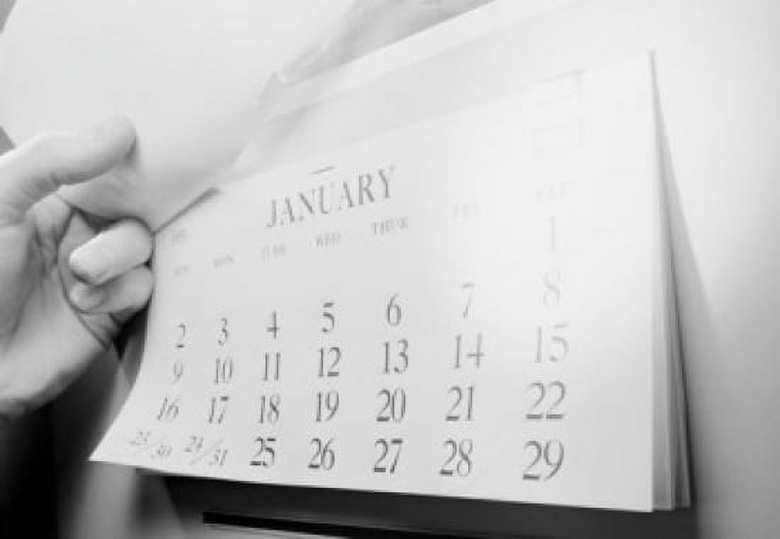 Hand opening calendar showing January Canvas Art - (18 x 24)