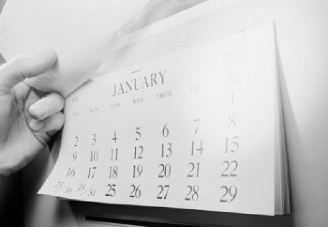 Hand opening calendar showing January Canvas Art - (24 x 36)
