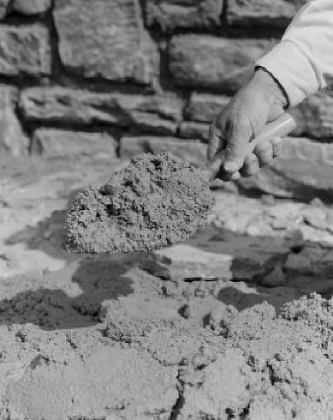 Hand with trowel of cement Canvas Art - (18 x 24)