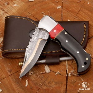 Handmade Copper Damascus Folding Knife: Bull Horn Handle, Leather Sheath