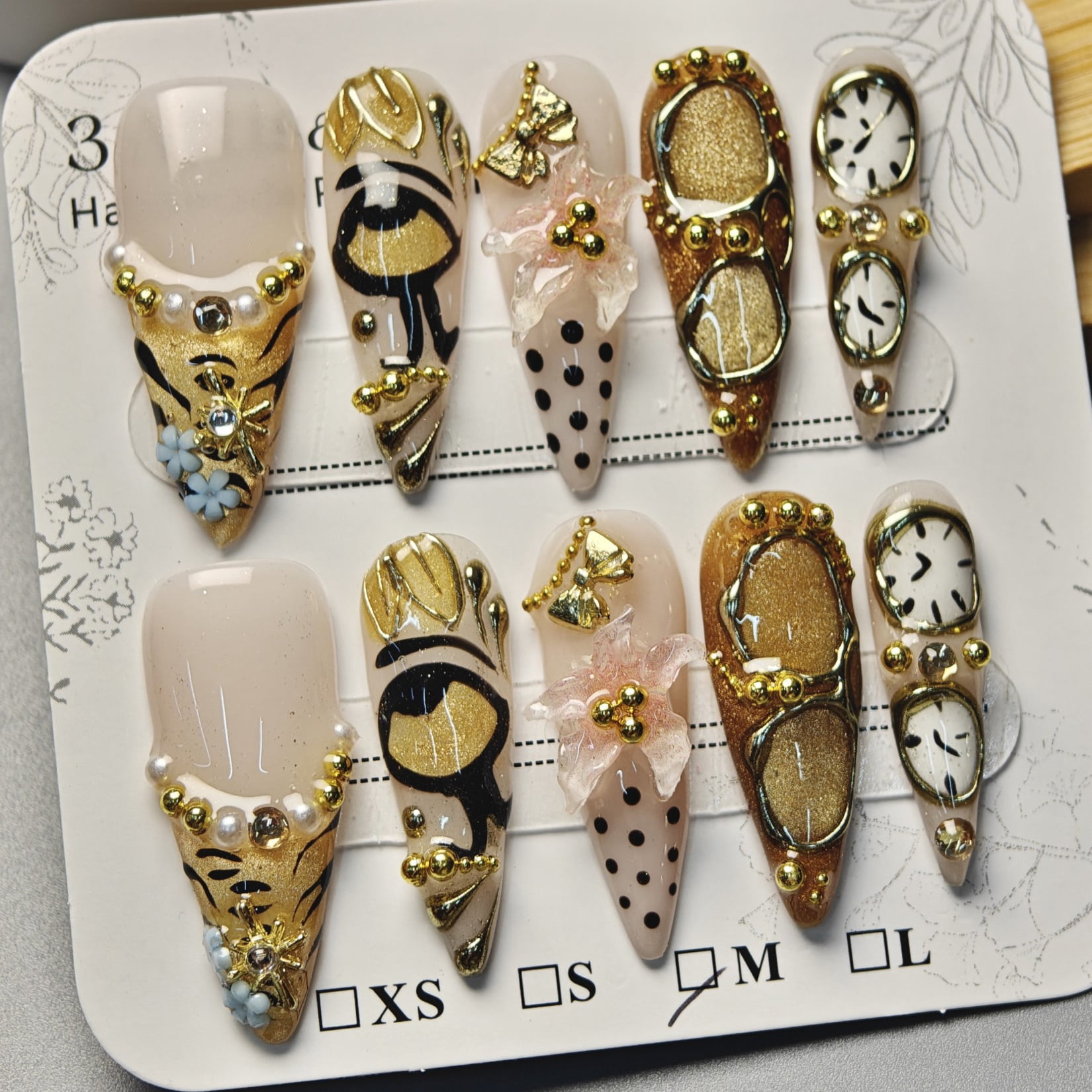 Handmade Press-on Nails with Gold Accents and 3D Artistic Design