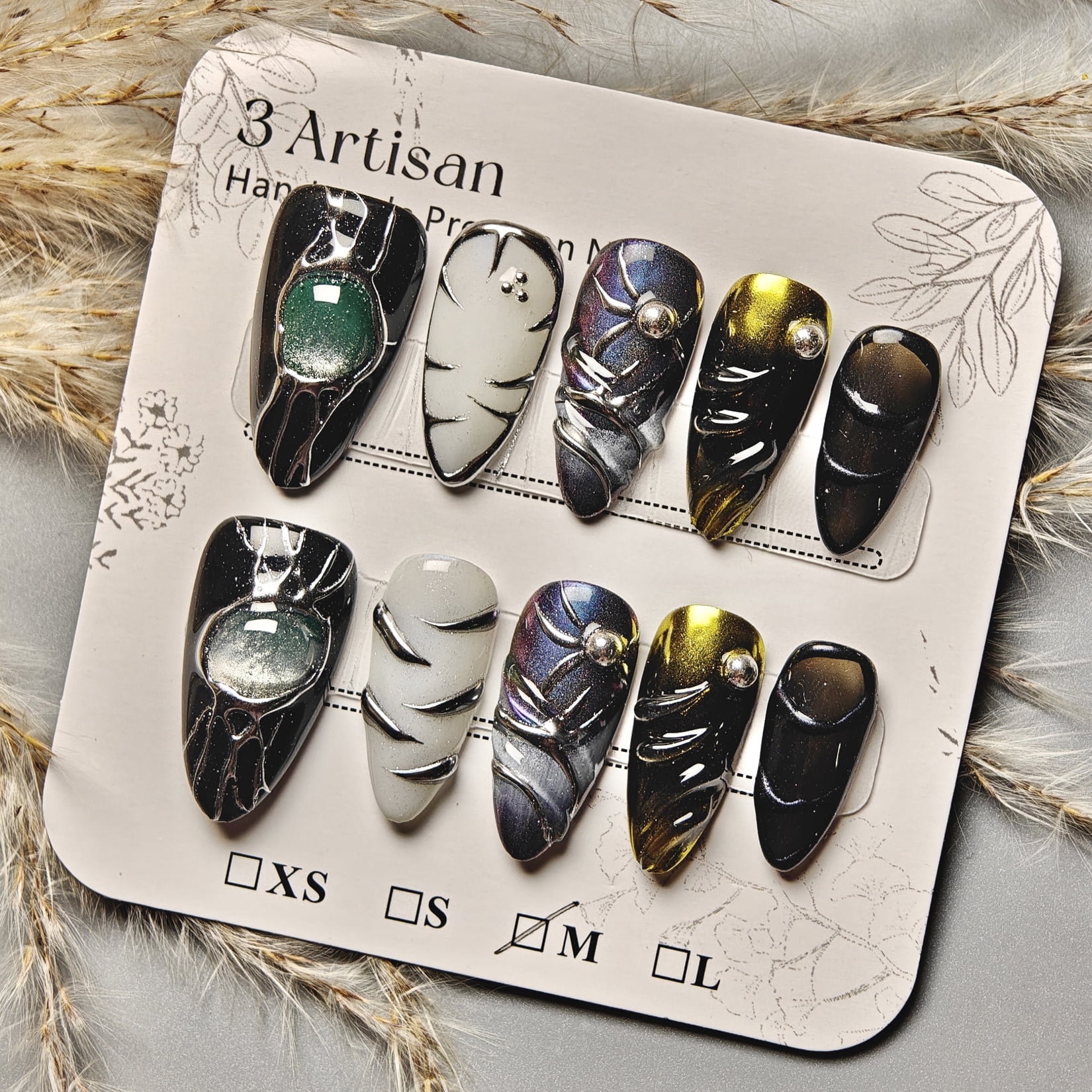 Handmade Press-on Nails with Metallic Accents and Elegant Design