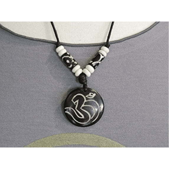Handmade Yak bone Sanskrit Om pendant necklace with waxed cord