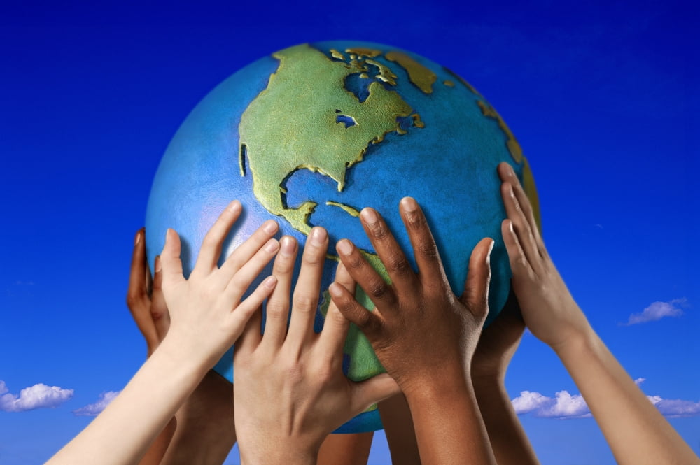 Hands On A Globe Canvas Art - Don Hammond Design Pics (17 x 11)