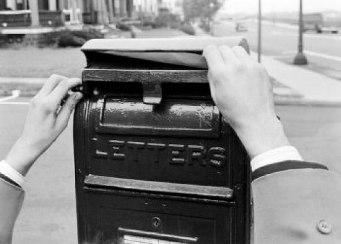Hands mailing letter in letter box Canvas Art - (24 x 36)