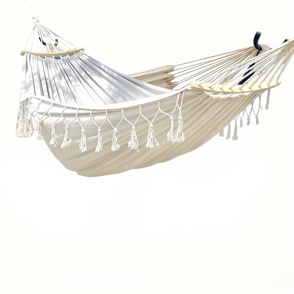 Handwoven portable hammock with thickened widened canvas and anti-slip design. Decorated with bohemian fringes, perfect for patio, camping and gifting.