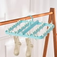 thumbnail image 1 of Hanging Clothes Rack with 24 Clips, Foldable Laundry Hanger for Socks, Underwear, and Small Clothes, Windproof and Quick Drying Plastic Laundry Rack, 1 of 6