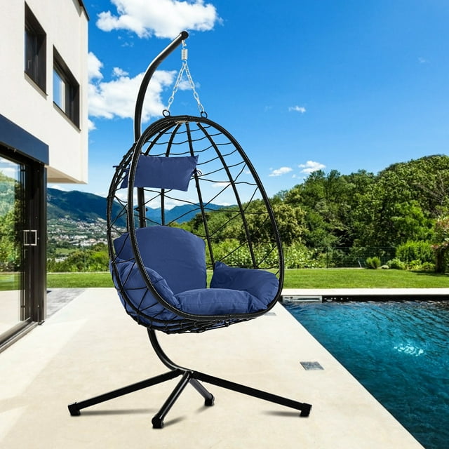Hanging Wicker Egg Chair with Stand and Dark Blue Cushion, Heavy Duty Steel Frame Resin Wicker Hanging Chair, Outdoor Indoor UV Resistant Furniture Swing Chair with Headrest Pillow, 264lbs